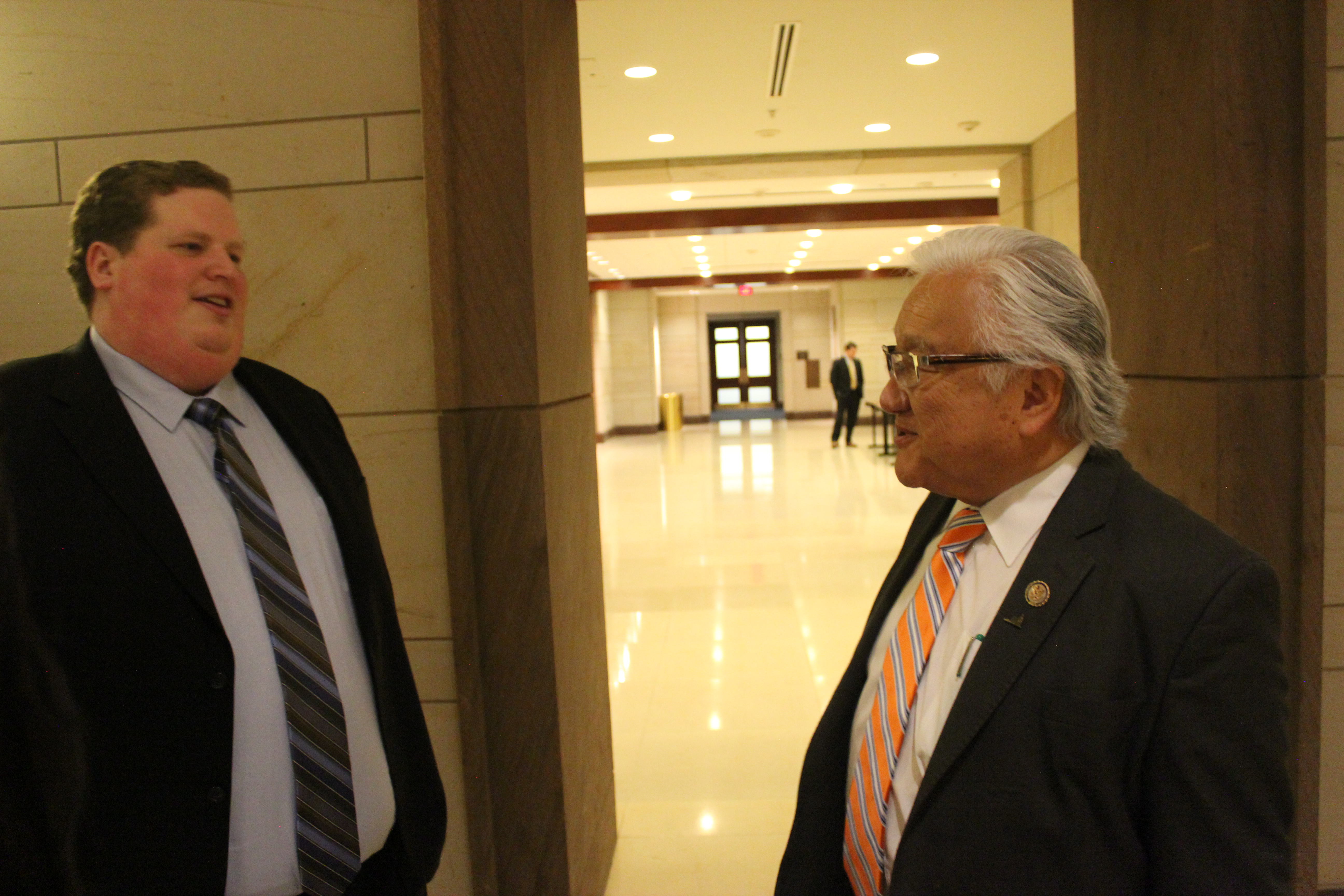 AHA Legislative Associated Matthew Bulger speaks with Rep. Mike Honda, a co-sponsor of the bill.